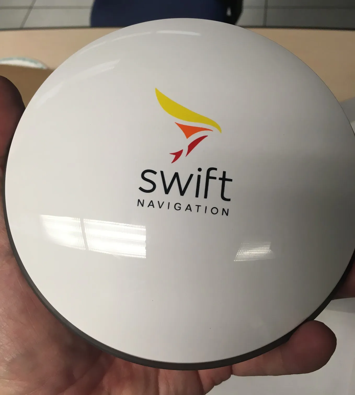 GPS500 antenna top view showing Swift Navigation logo